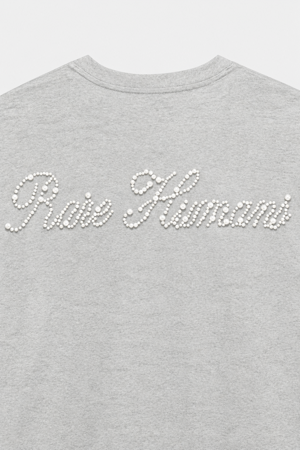 Close-up of the pearl Rare Humans logo on the back of the grey Pearl Longsleeve