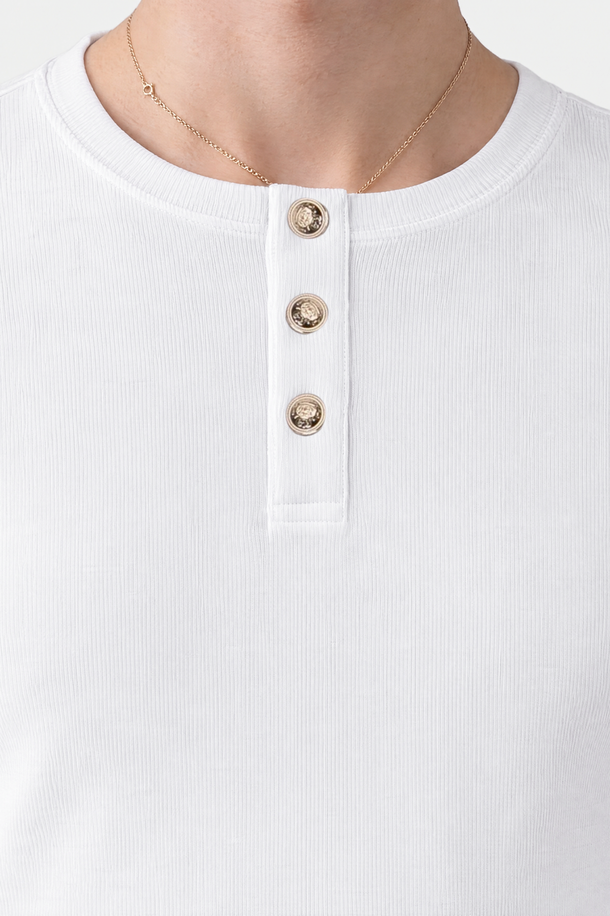 Detail of the three-button placket with custom-made buttons on the white Henley Shortsleeve by Rare Humans